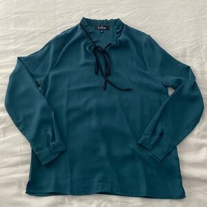 Lulu’s green blouse